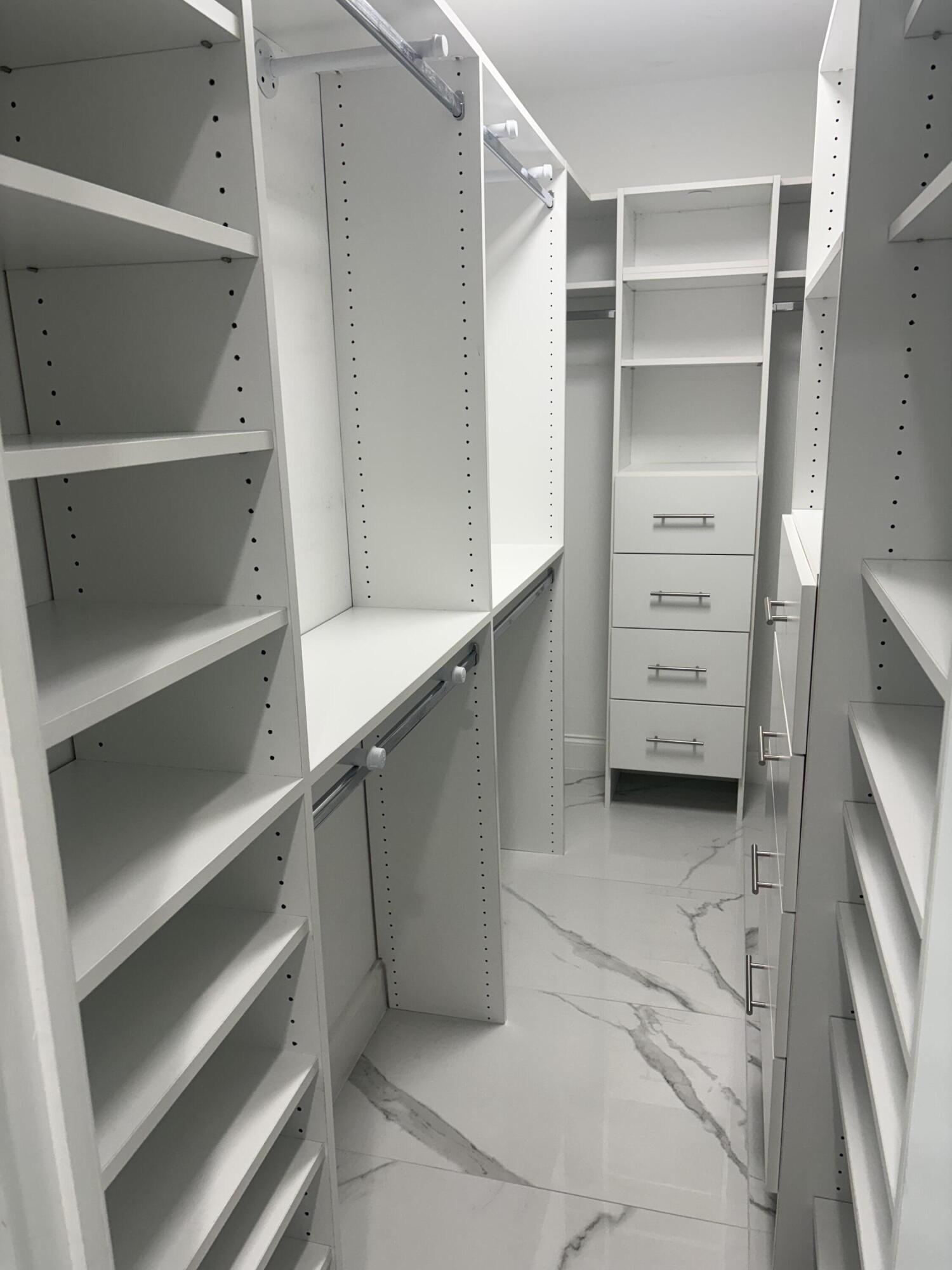 18255 181st Circle South Boca Raton, FL 33498 - Photo 6 of 16 a view of walk in closet