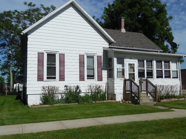 401 North 3rd Street Rochelle, IL 61068 - Photo 1 of 5 a view of a house with a yard and plants