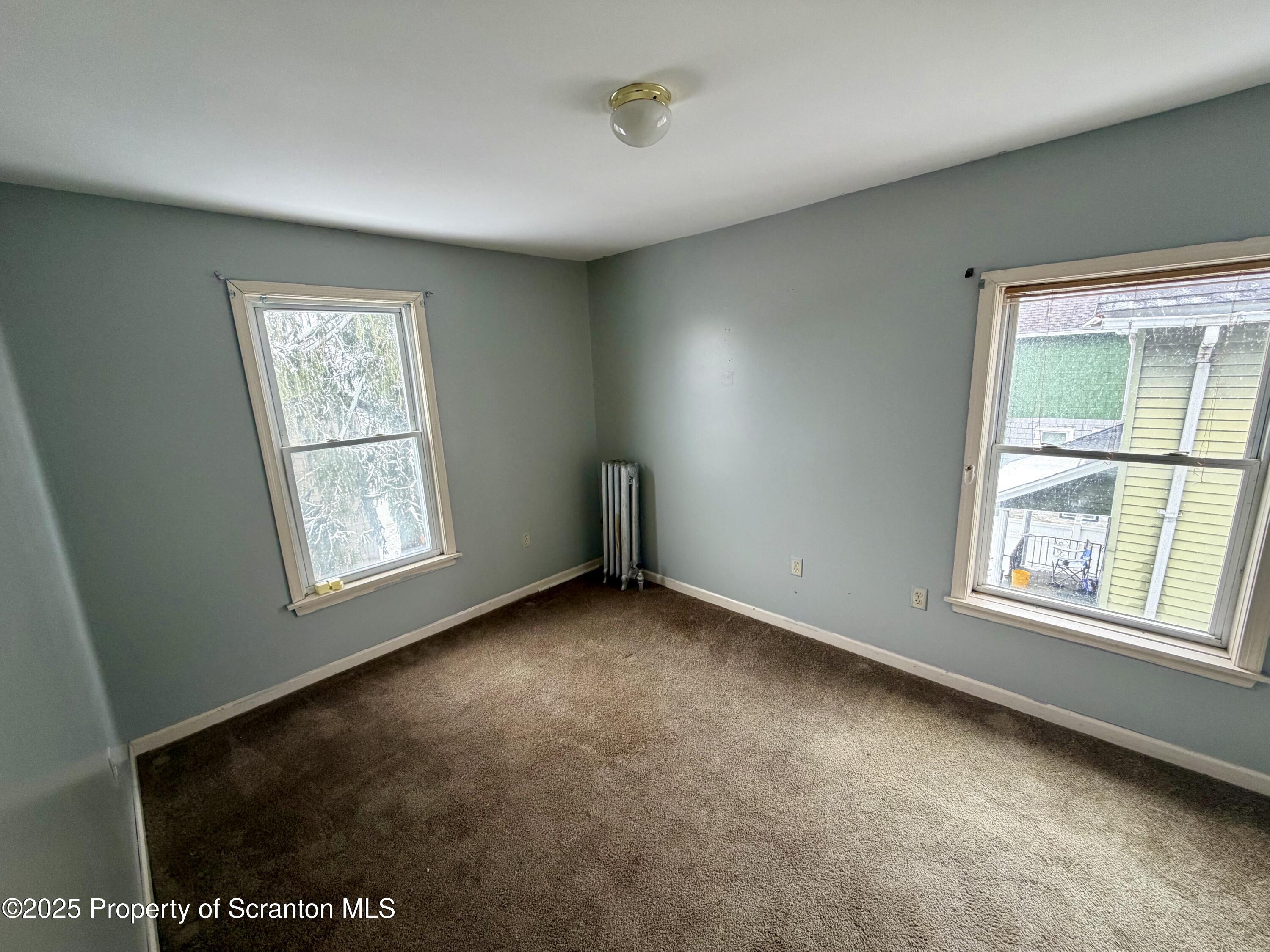 818 West Locust Street Scranton, PA 18504 - Photo 11 of 15 an empty room with a window