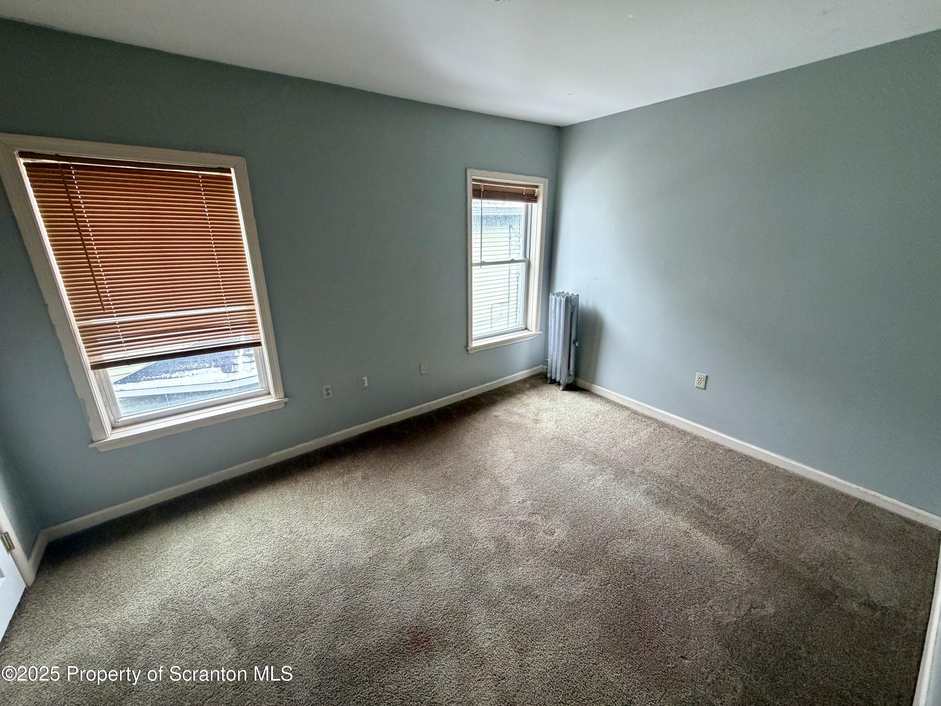 818 West Locust Street Scranton, PA 18504 - Photo 12 of 15 a view of an empty room with a window