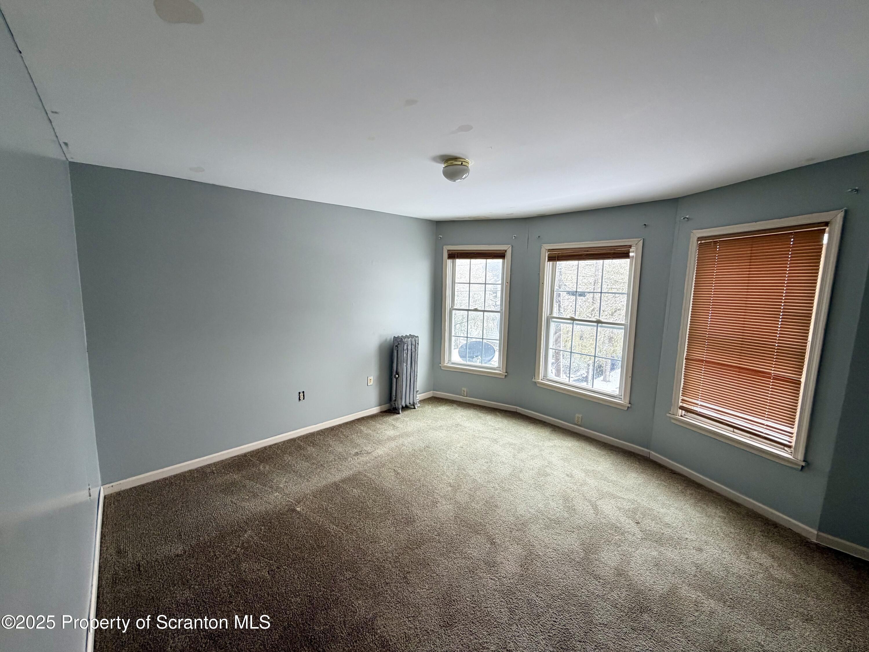 818 West Locust Street Scranton, PA 18504 - Photo 13 of 15 a view of an empty room with a window