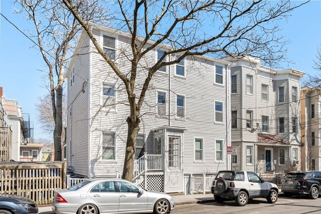 a car parked in front of a building