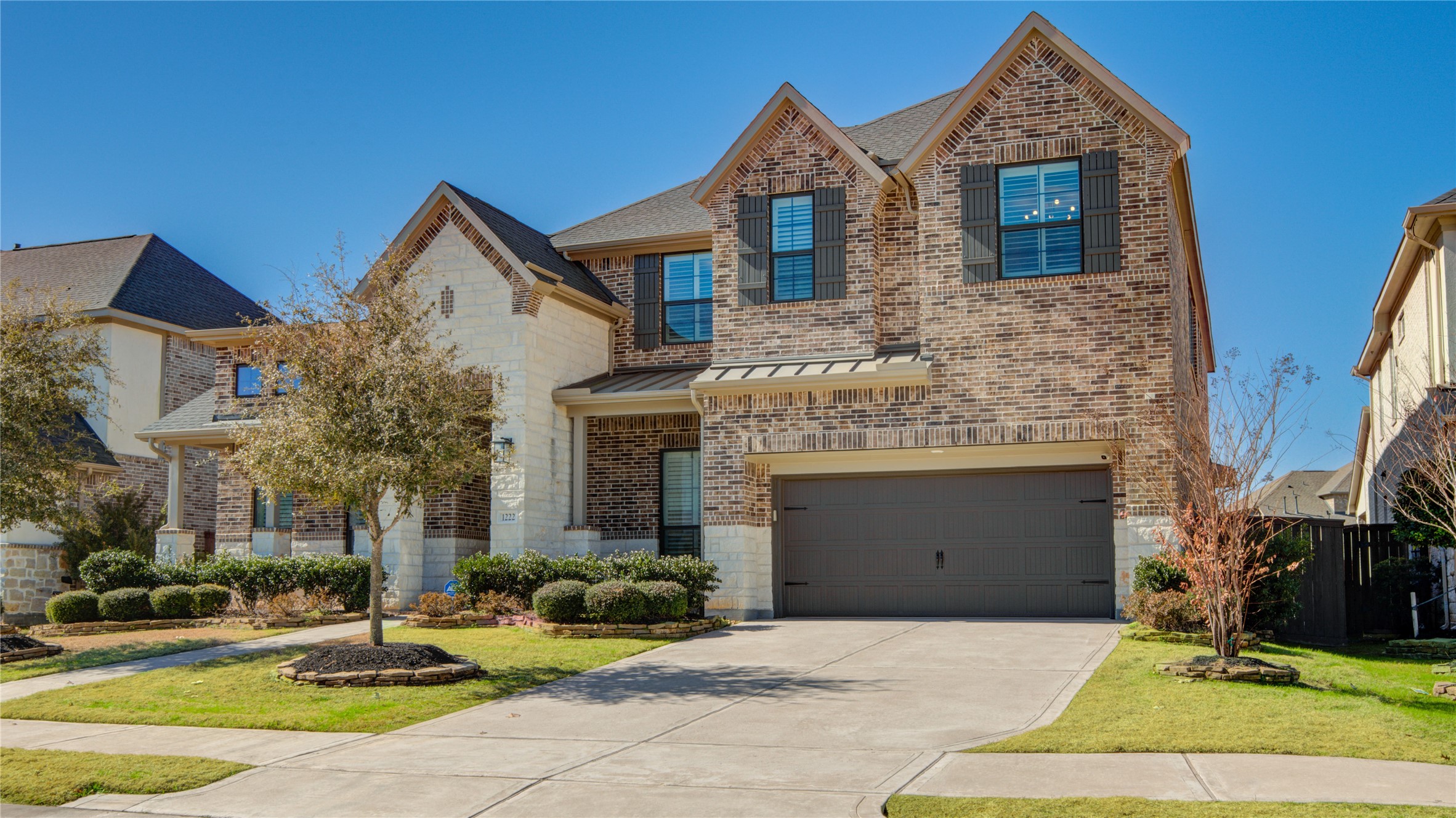 1222 McMurtry Ridge Drive Katy, TX 77494 - Photo 2 of 49 a front view of a house with yard and parking