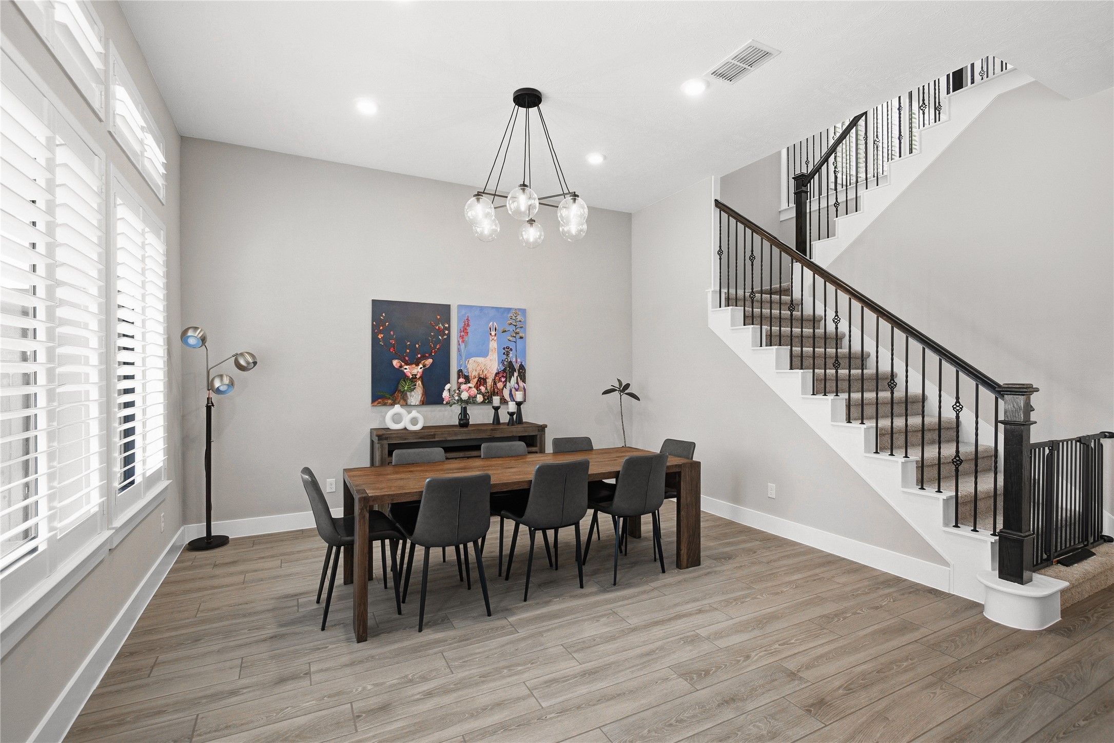 1222 McMurtry Ridge Drive Katy, TX 77494 - Photo 22 of 49 a view of a dining room with furniture window and wooden floor