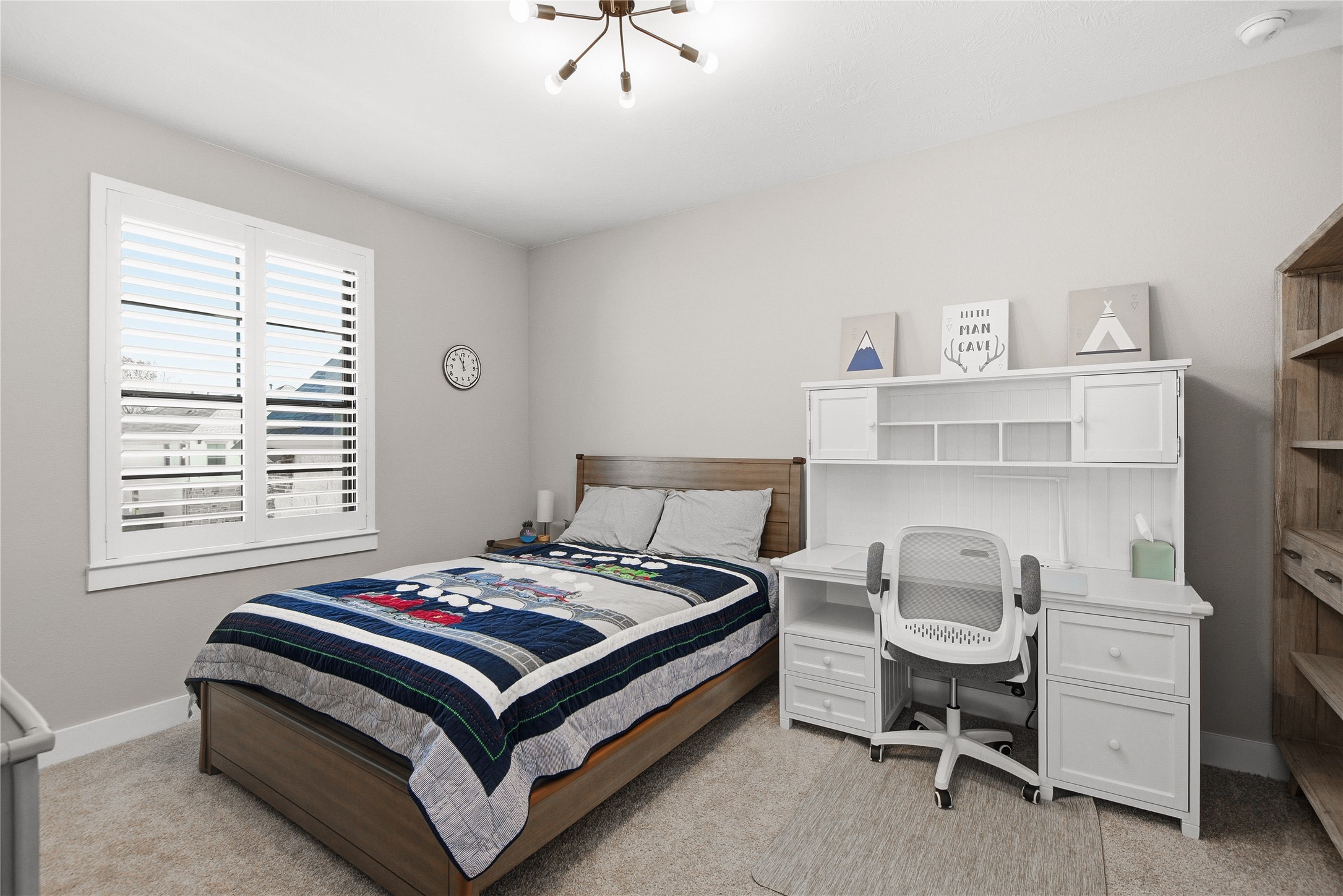 1222 McMurtry Ridge Drive Katy, TX 77494 - Photo 35 of 49 a bedroom with a bed and a window