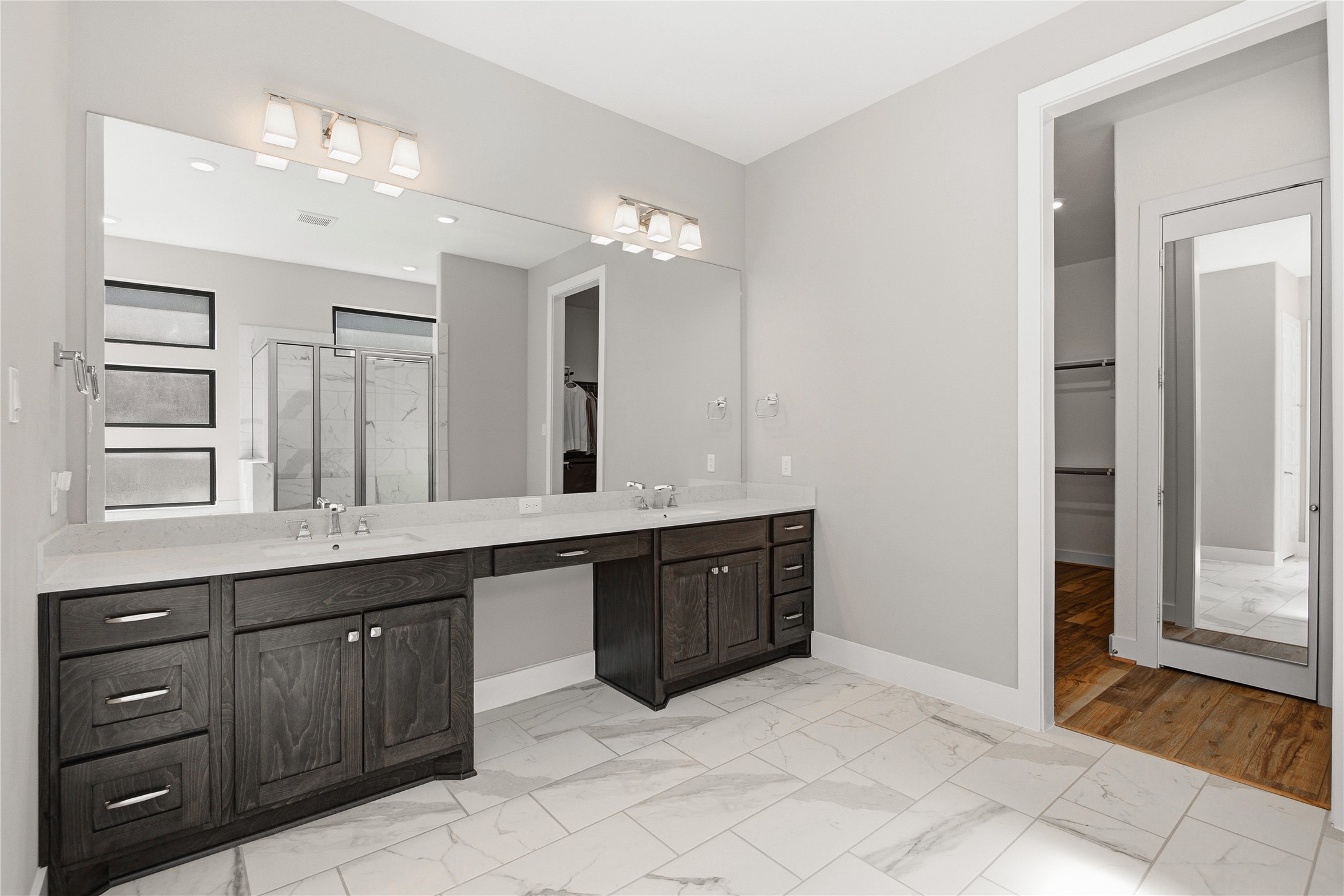 1222 McMurtry Ridge Drive Katy, TX 77494 - Photo 41 of 49 a spacious bathroom with a granite countertop double vanity sink a mirror and a bathtub