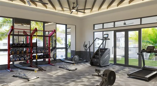 a room with lots of windows and furniture