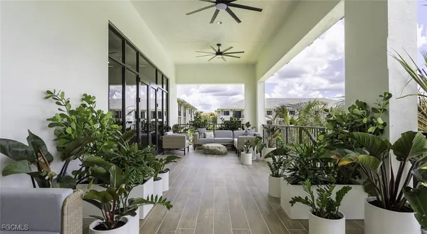 a view of a porch with seating space