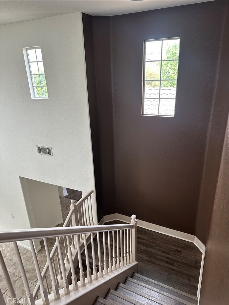 11306 Trailstone Court Riverside, CA 92505 - Photo 29 of 47 a view of entryway with wooden floor