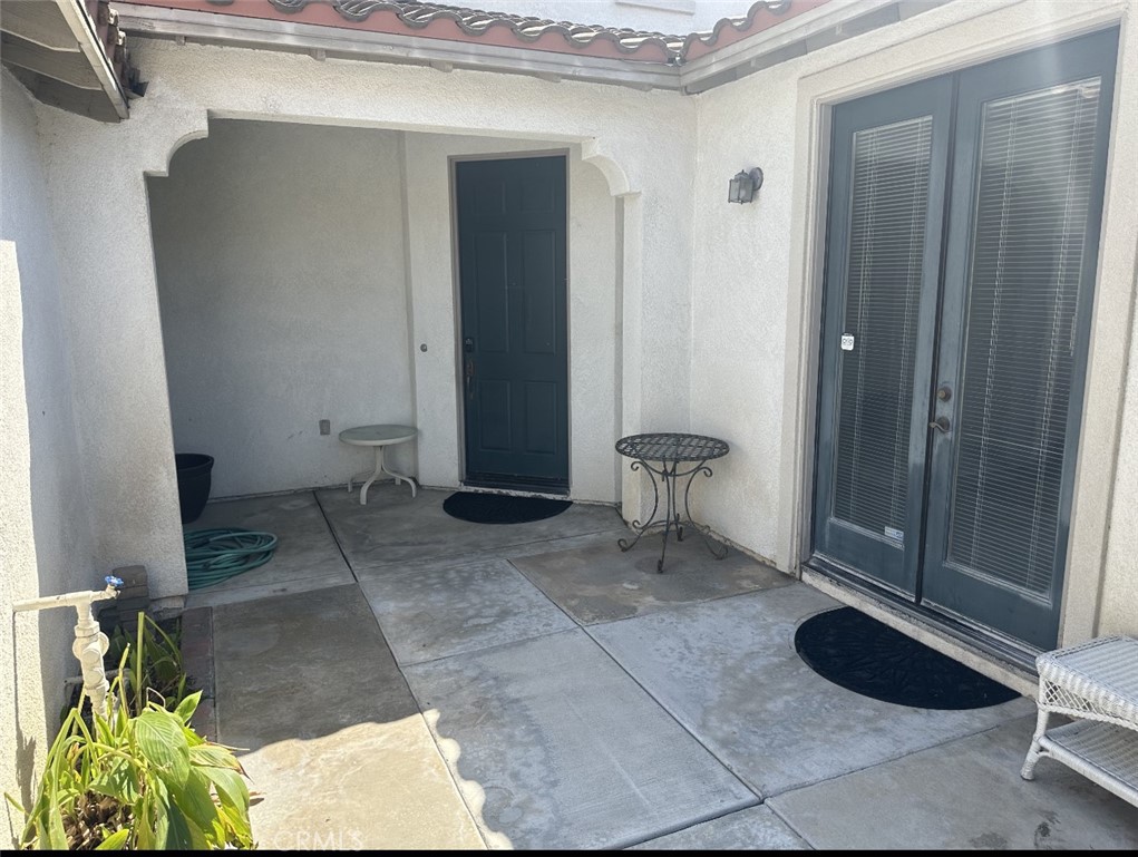 11306 Trailstone Court Riverside, CA 92505 - Photo 3 of 47 a bath room with a sink and a mirror