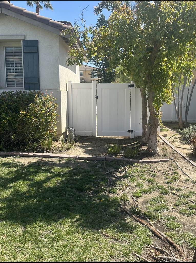 11306 Trailstone Court Riverside, CA 92505 - Photo 5 of 47 a view of a backyard of the house