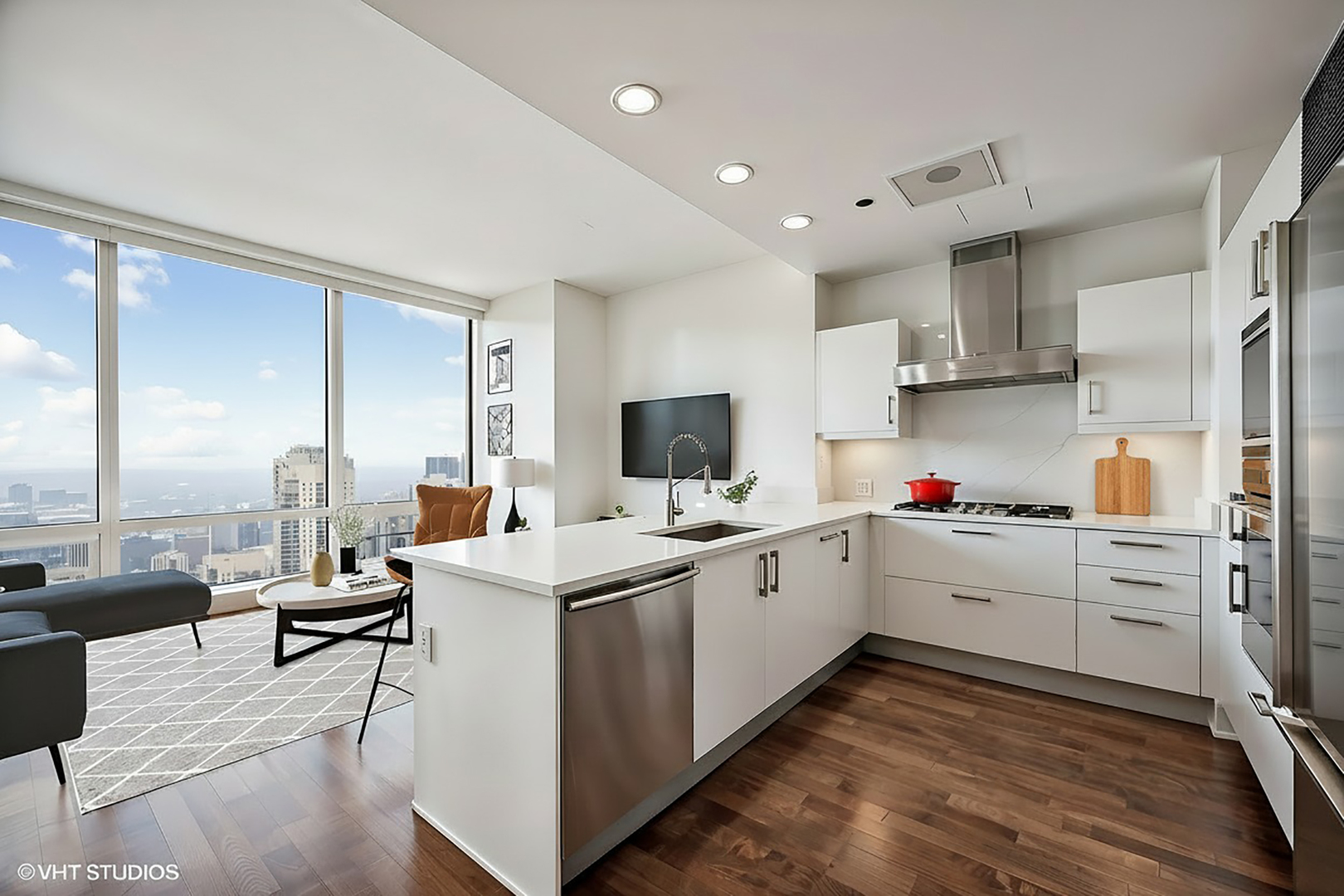 401 North Wabash Avenue, Unit 42E Chicago, IL 60611 - Photo 3 of 55 a kitchen with white cabinets and sink