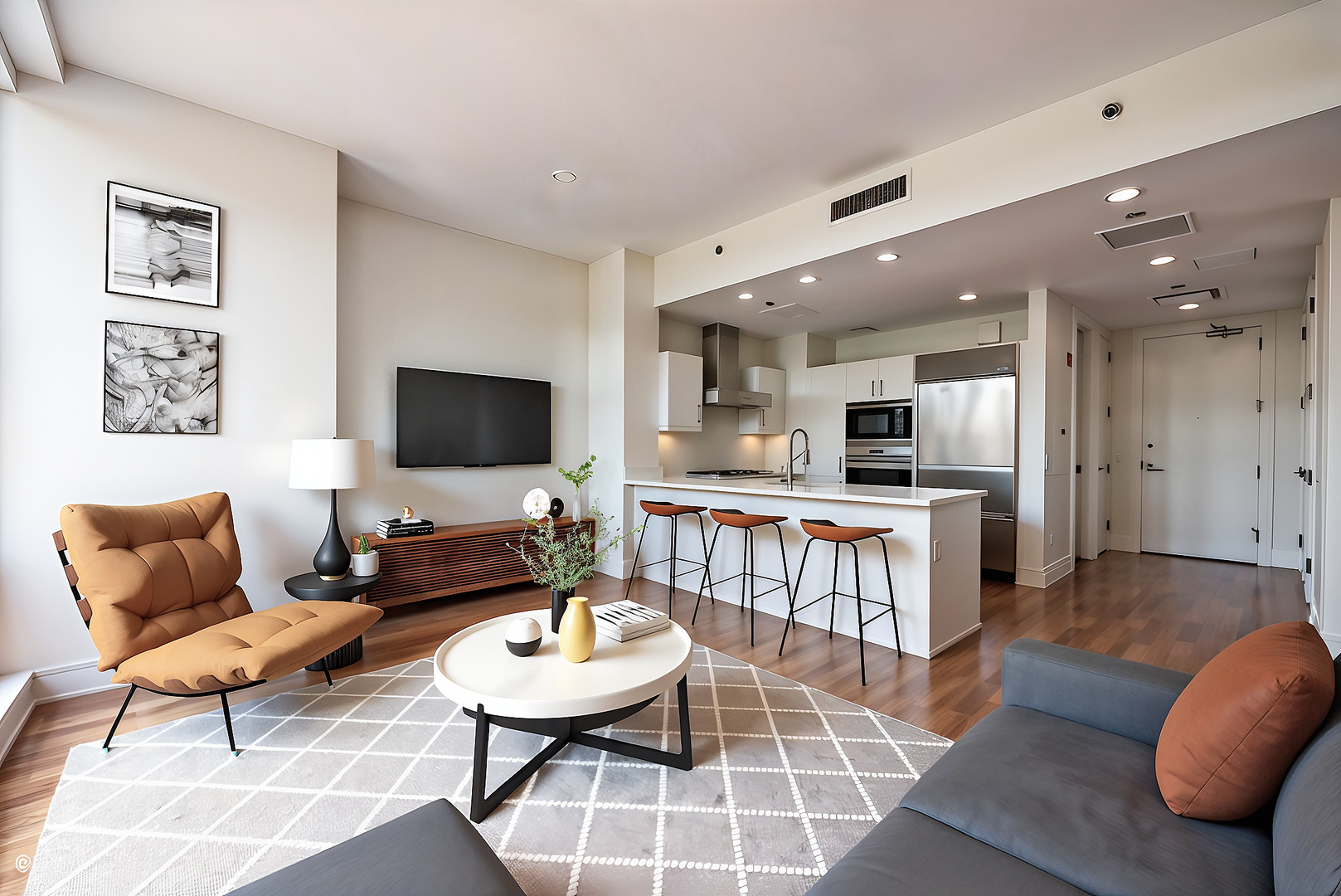 401 North Wabash Avenue, Unit 42E Chicago, IL 60611 - Photo 5 of 55 a living room with furniture and a flat screen tv