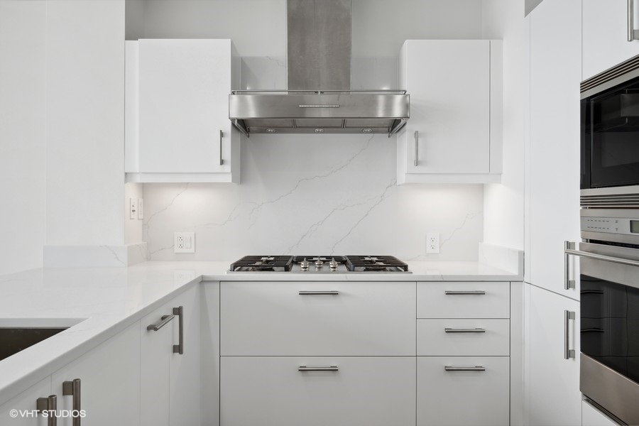 401 North Wabash Avenue, Unit 42E Chicago, IL 60611 - Photo 9 of 55 a view of a kitchen with appliances