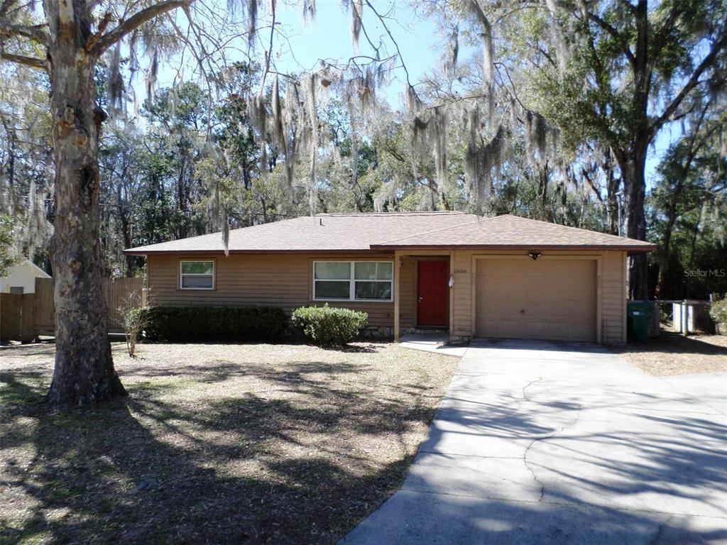 a house with trees in front of it