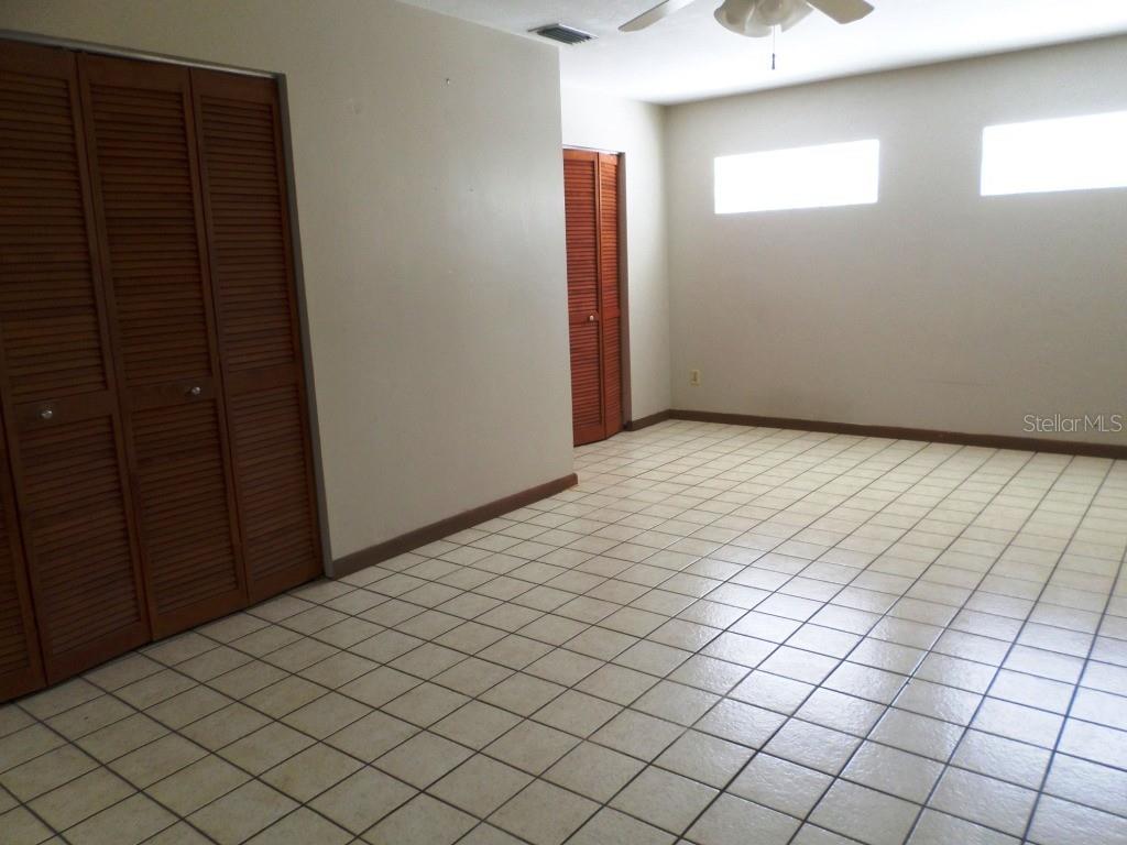 11606 Kennesaw Road Dunnellon, FL 34431 - Photo 14 of 33 an empty room with windows