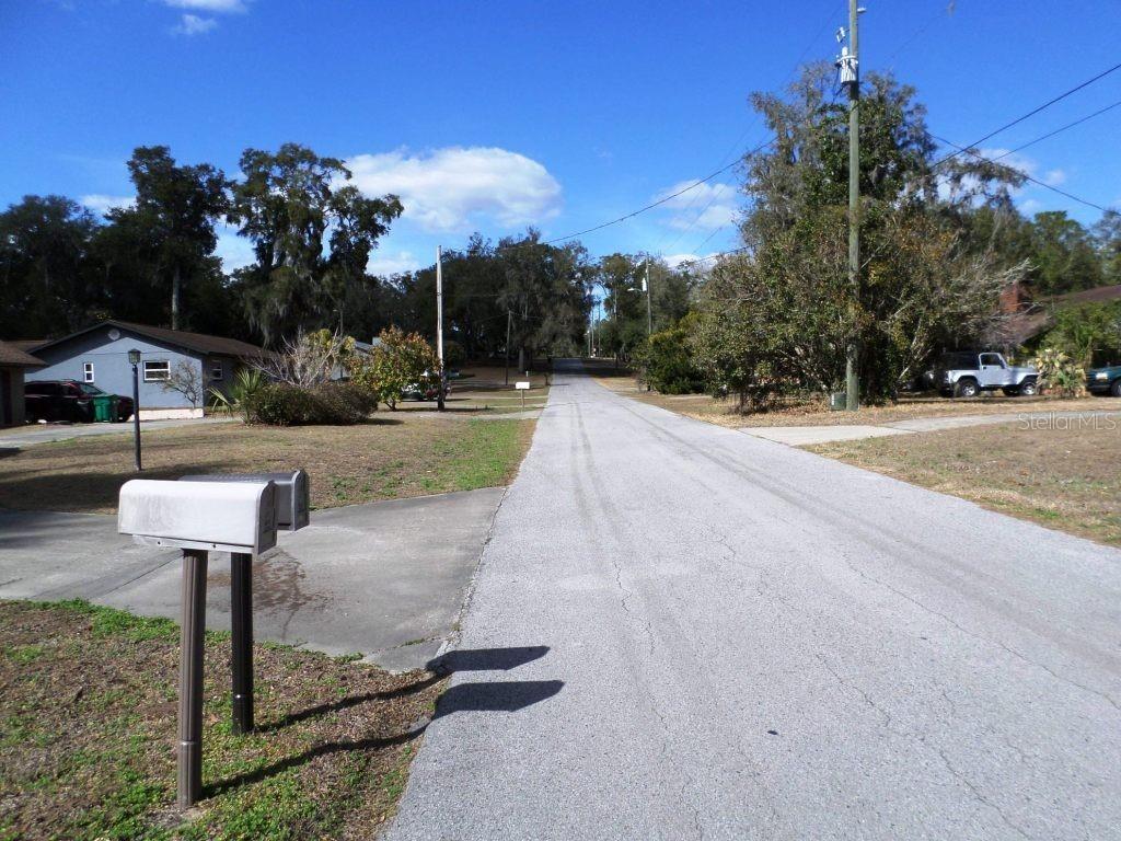 11606 Kennesaw Road Dunnellon, FL 34431 - Photo 32 of 33 a front view of a house with garden