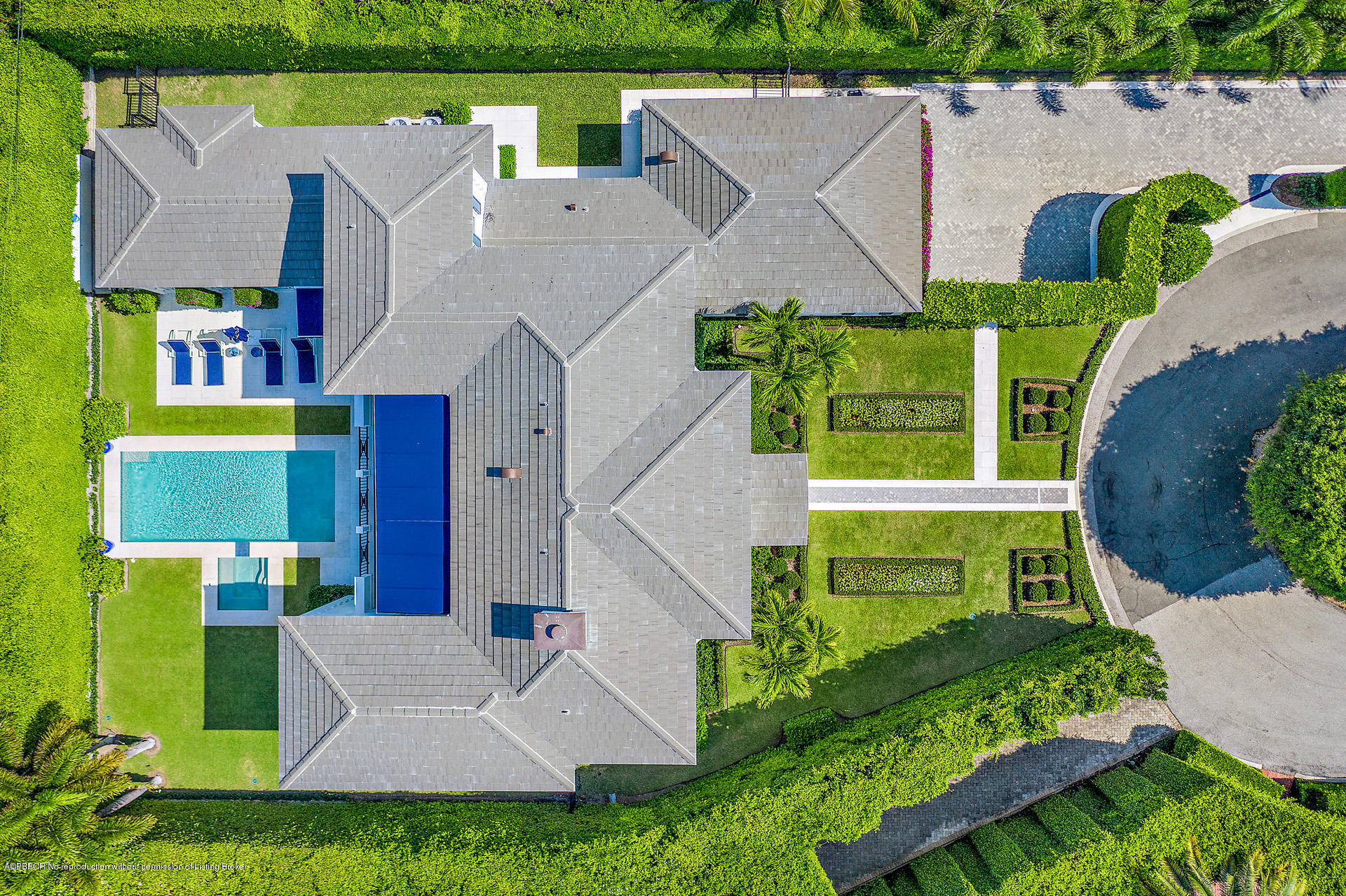 309 Dunbar Road Palm Beach, FL 33480 - Photo 2 of 24 an aerial view of a house with a garden