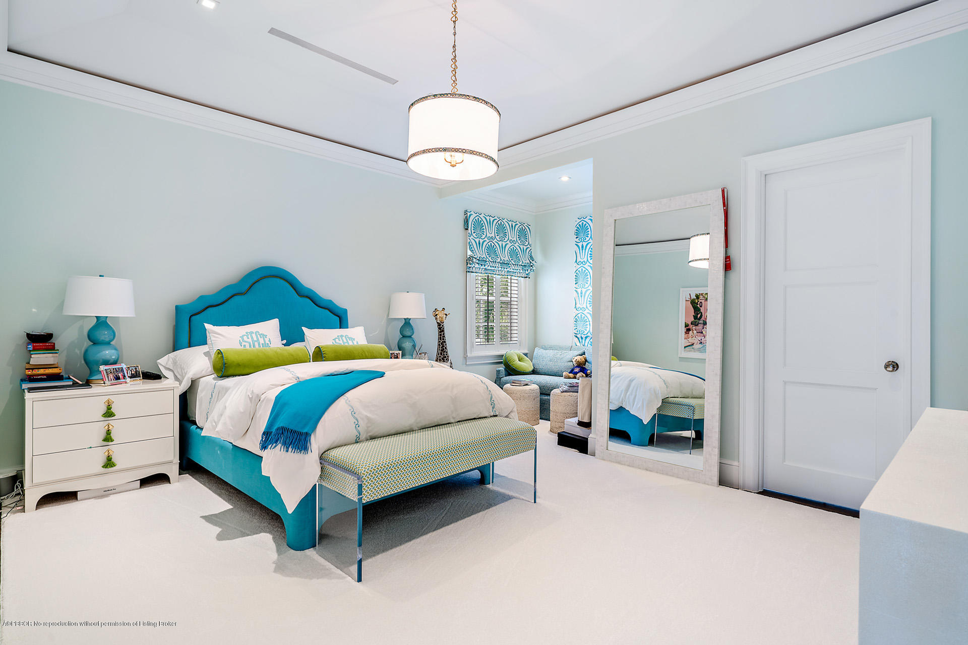 309 Dunbar Road Palm Beach, FL 33480 - Photo 21 of 24 a spacious bedroom with a bed and a chandelier