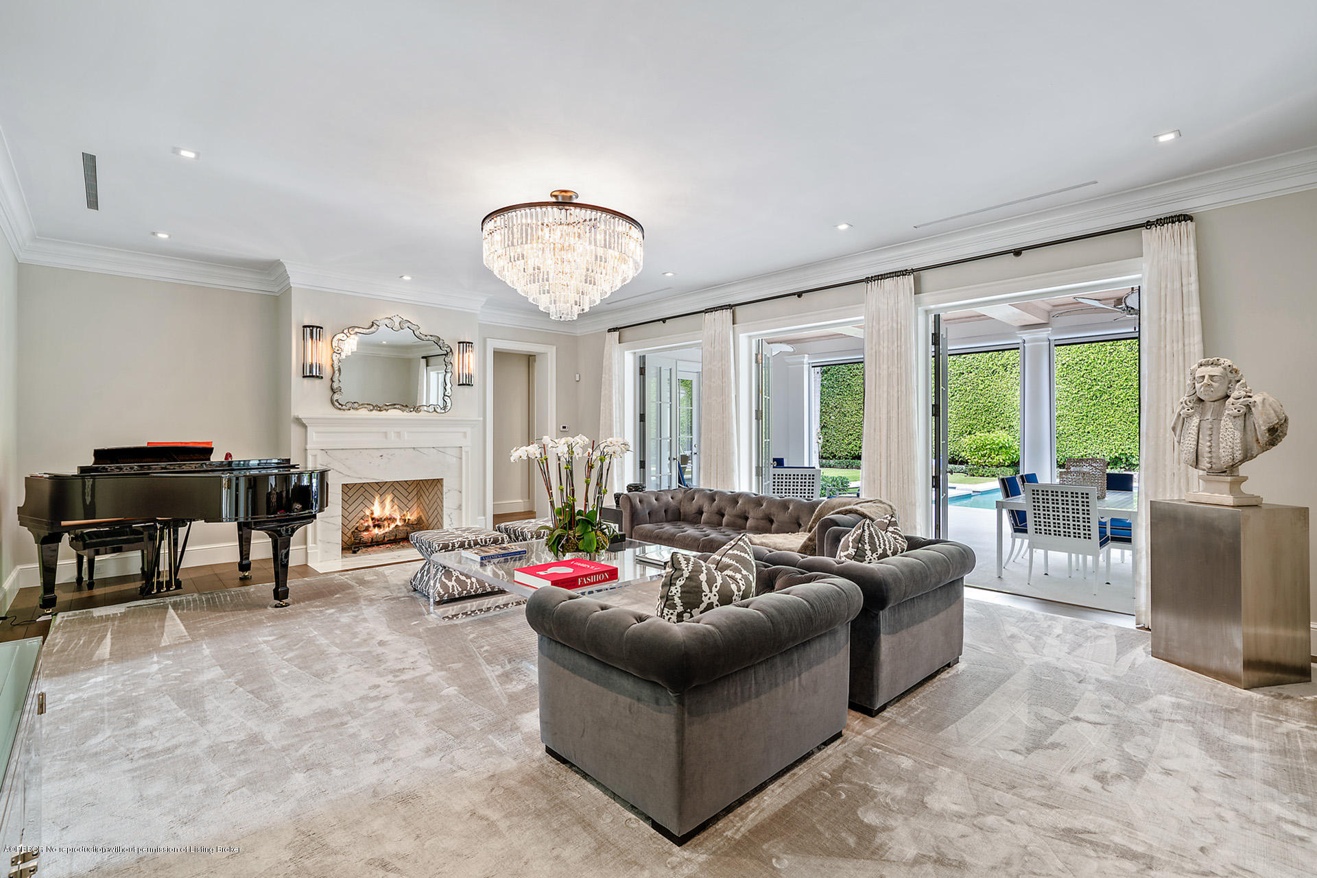 309 Dunbar Road Palm Beach, FL 33480 - Photo 4 of 24 a living room with furniture and a large window