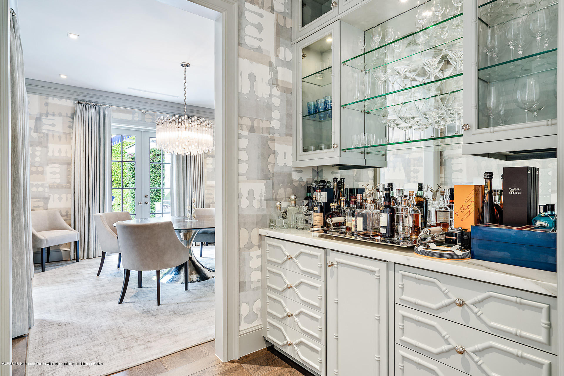 309 Dunbar Road Palm Beach, FL 33480 - Photo 7 of 24 a view of a dining room with furniture and a window