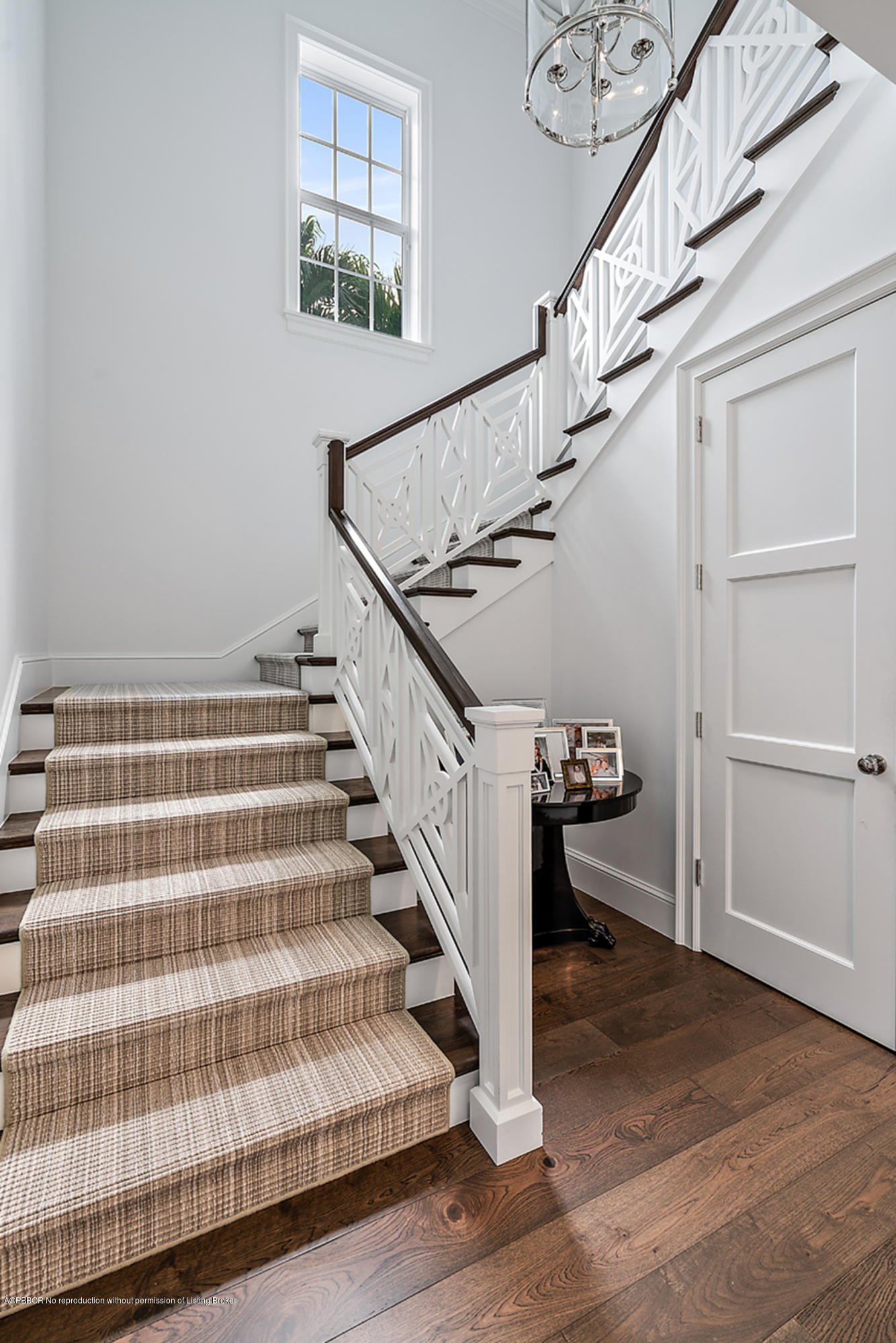 309 Dunbar Road Palm Beach, FL 33480 - Photo 8 of 24 a view of entryway and hall with wooden floor