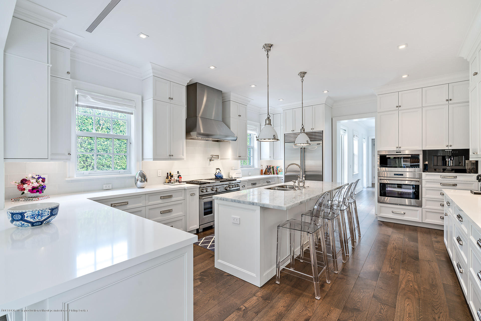 309 Dunbar Road Palm Beach, FL 33480 - Photo 10 of 24 a kitchen with a stove a sink and a refrigerator