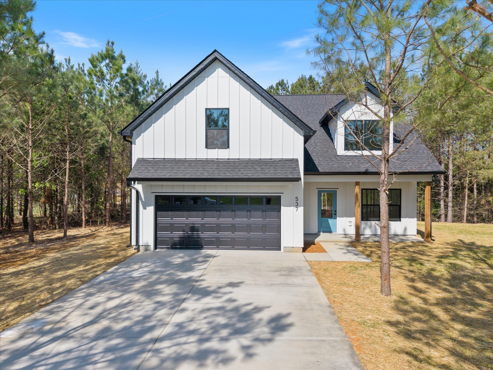537 Shelton Road Manchester, TN 37355 - Photo 1 of 36 a front view of a house with a yard