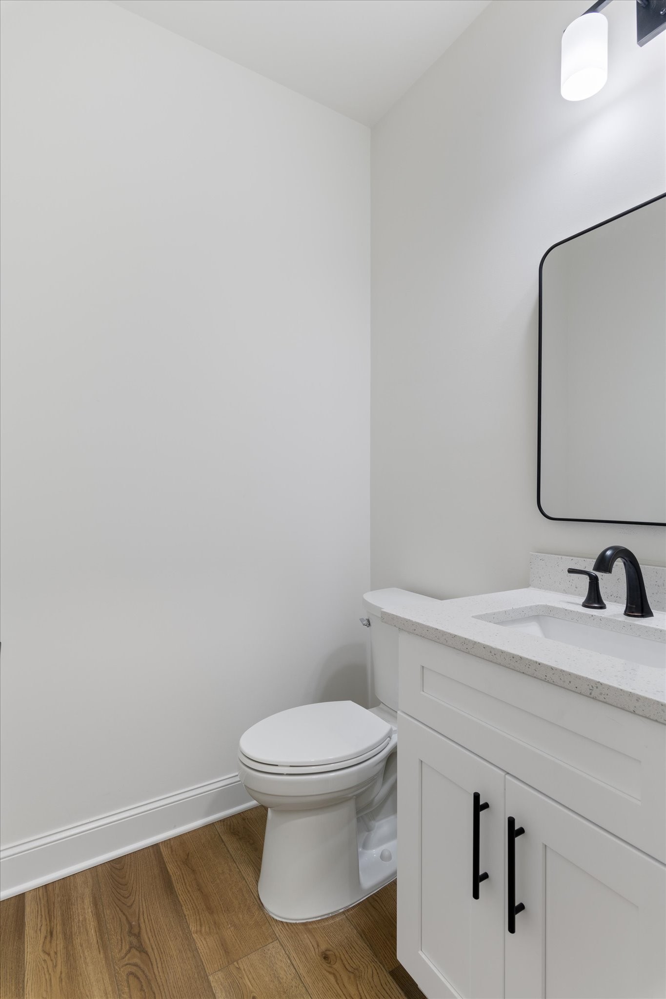 537 Shelton Road Manchester, TN 37355 - Photo 12 of 36 a bathroom with a toilet sink and mirror