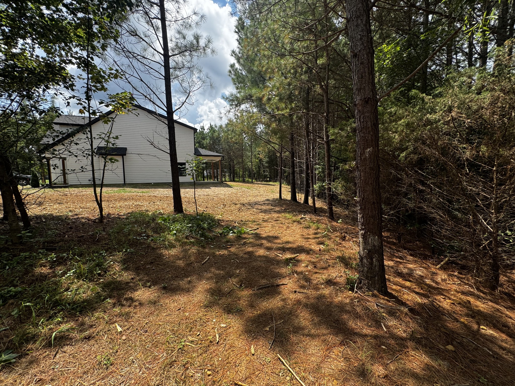 537 Shelton Road Manchester, TN 37355 - Photo 29 of 36 a view of white house with a yard