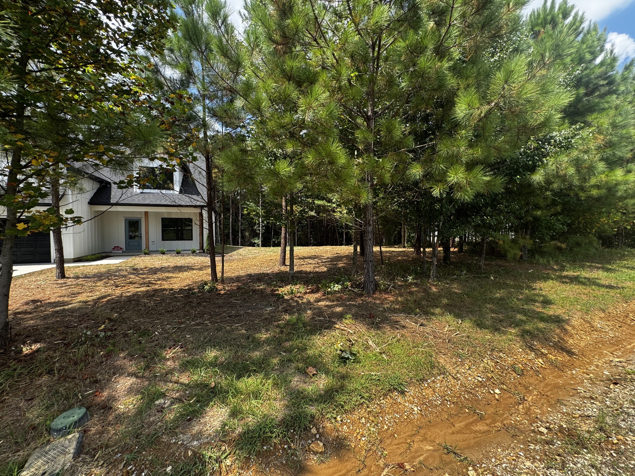 537 Shelton Road Manchester, TN 37355 - Photo 3 of 36 a backyard of a house with lots of green space