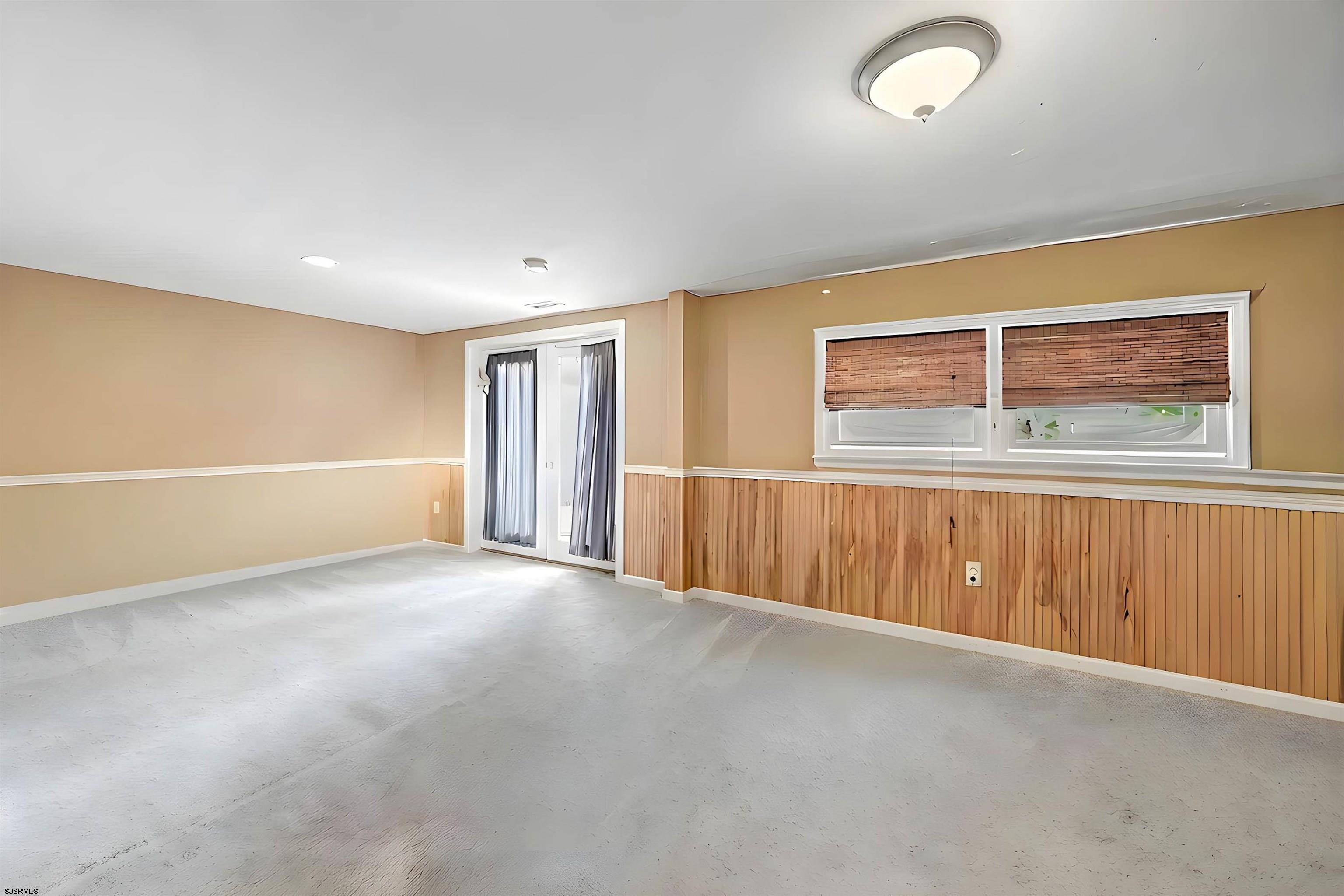 125 Exton Road Somers Point, NJ 08244 - Photo 30 of 35 a view of an empty room with a window