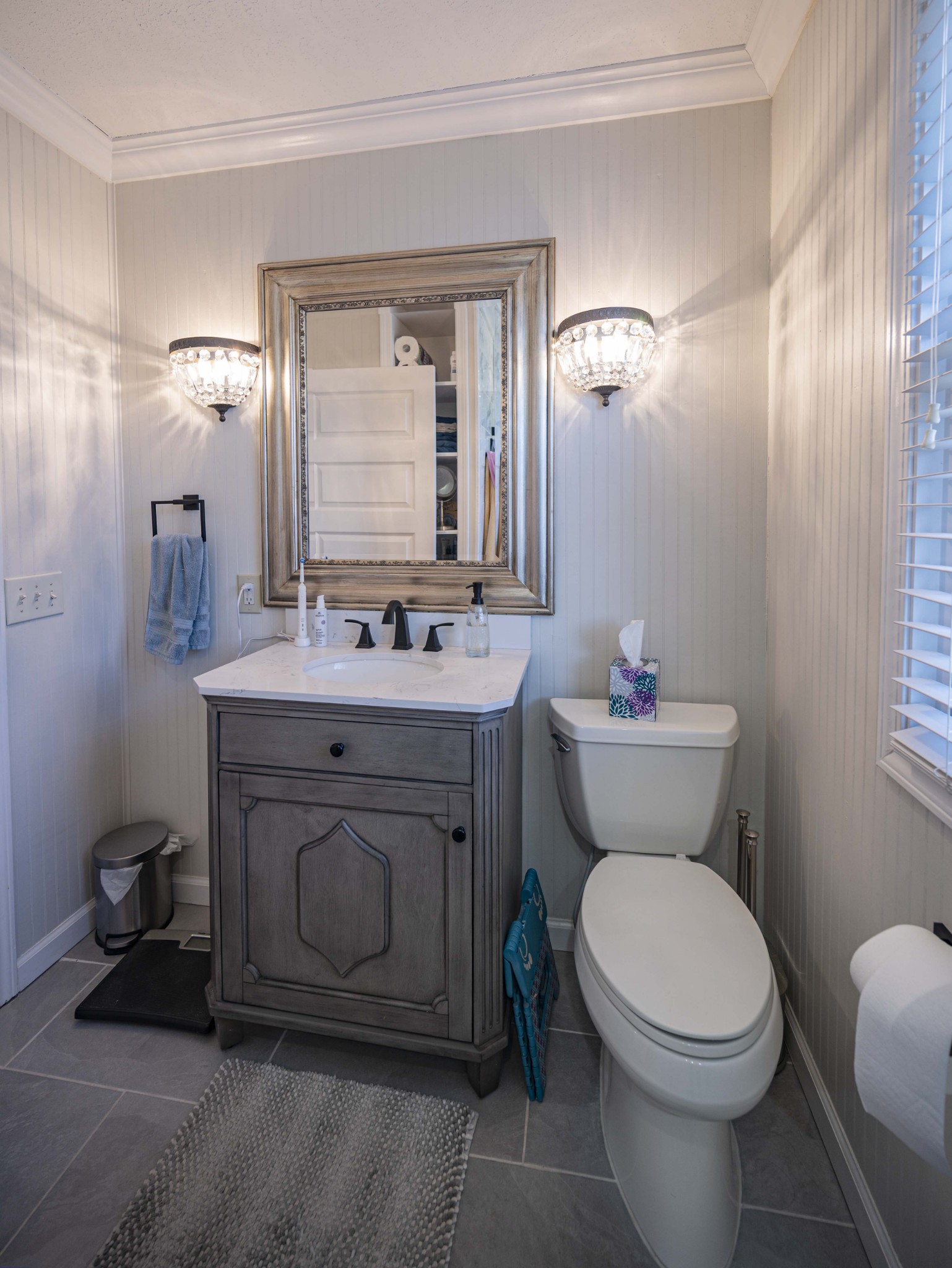 1015 Poplar Flatt Road Silver Point, TN 38582 - Photo 34 of 70 a bathroom with a toilet sink and mirror