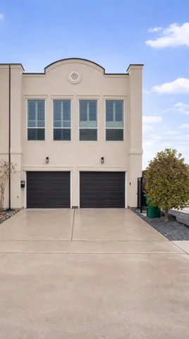 a front view of building with yard