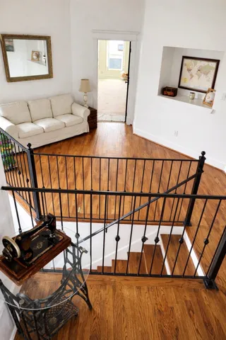 a view of entryway with wooden floor