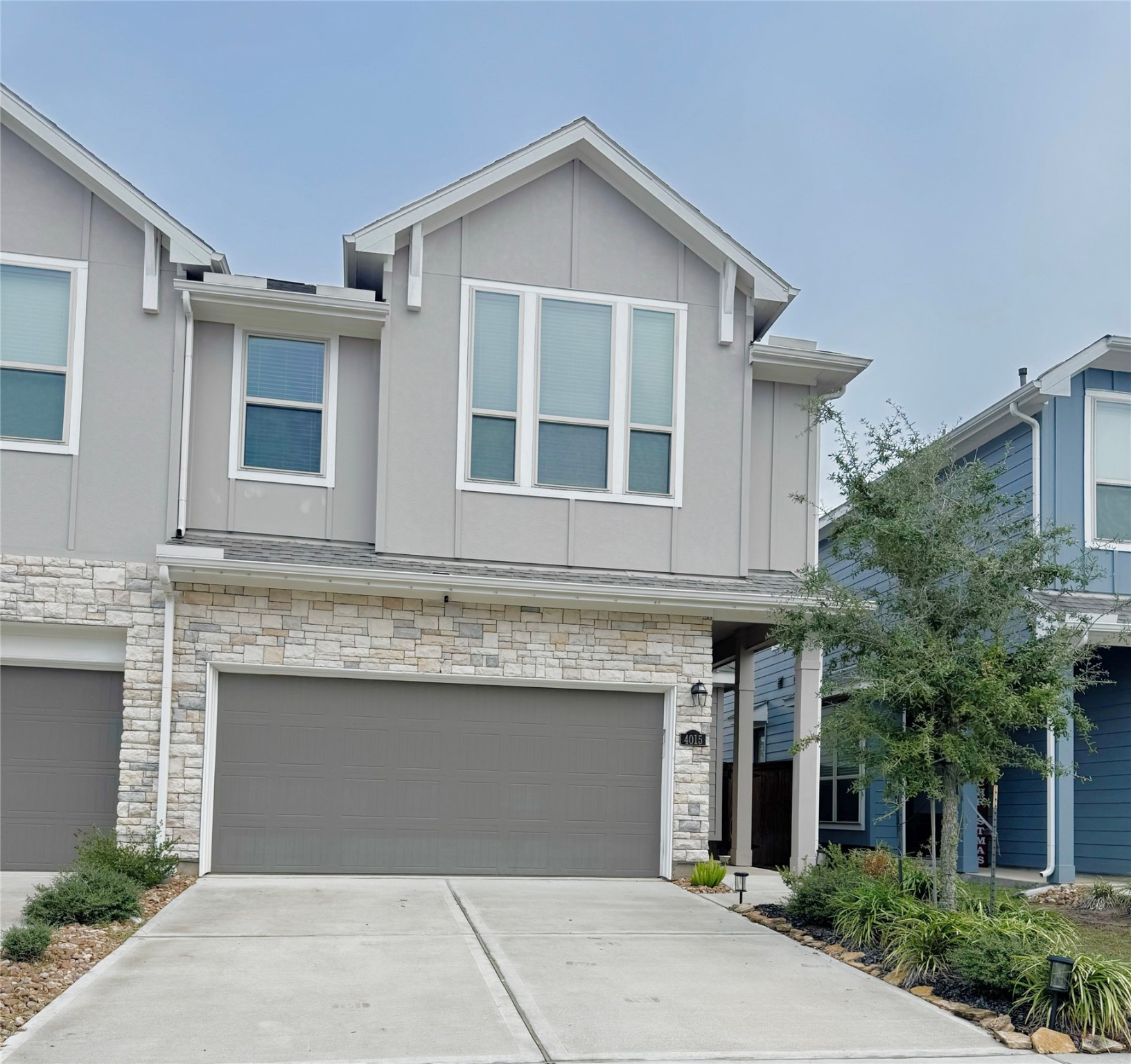 a front view of a house with yard