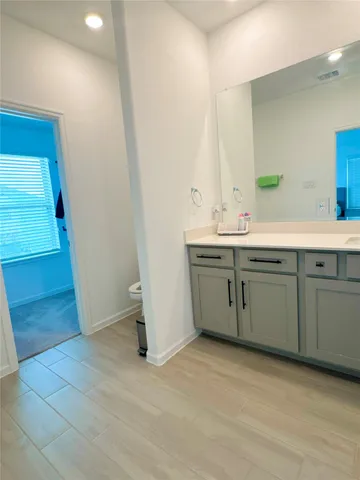 a kitchen with a sink cabinets and appliances