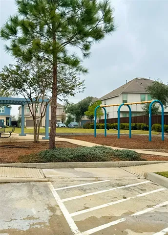 a view of a yard in front of a house