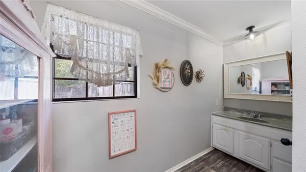 a kitchen with stainless steel appliances granite countertop a stove and a window