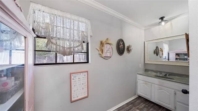 a kitchen with stainless steel appliances granite countertop a stove and a window