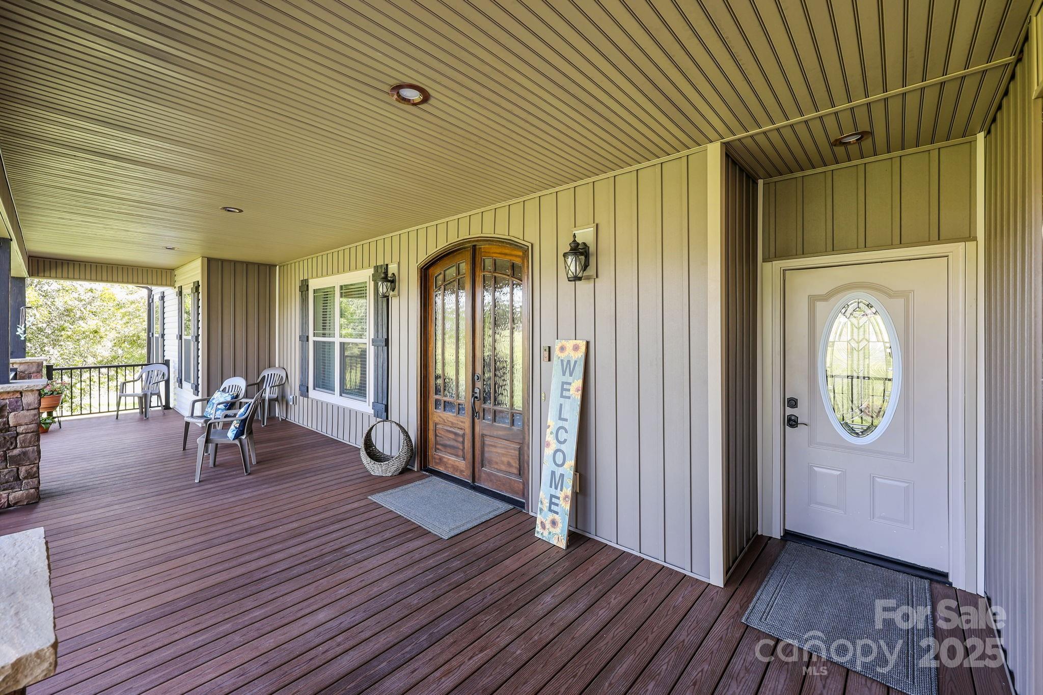 27040 Crepts Branch Road Locust, NC 28097 - Photo 13 of 48 a view of outdoor space with wooden floor and windows