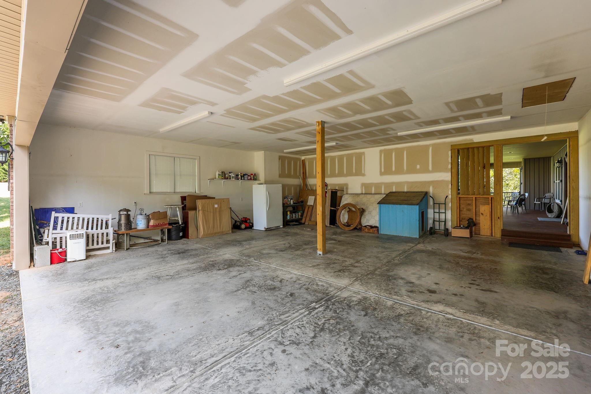 27040 Crepts Branch Road Locust, NC 28097 - Photo 15 of 48 a view of a car garage