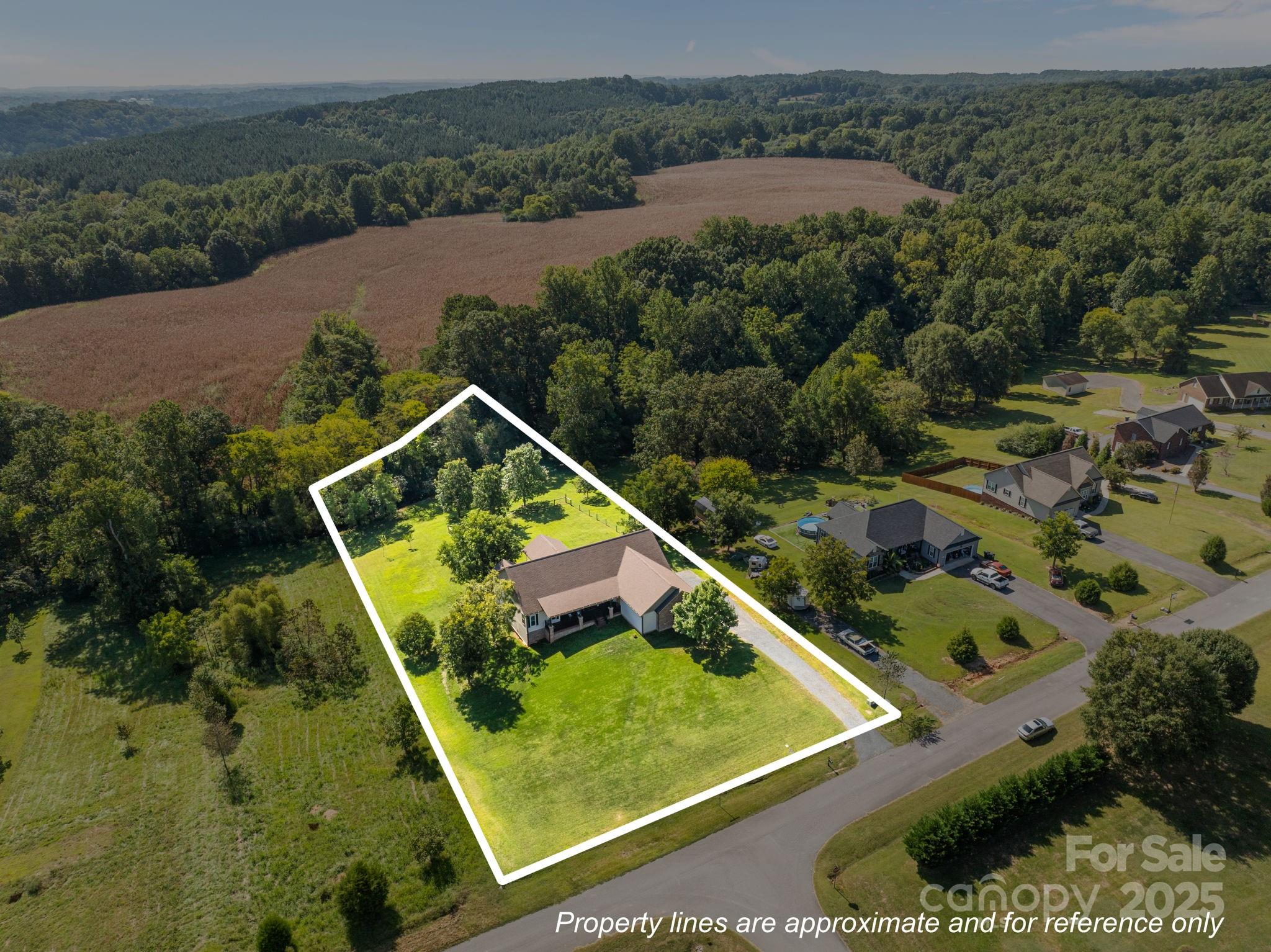 27040 Crepts Branch Road Locust, NC 28097 - Photo 47 of 48 an aerial view of house with a swimming pool