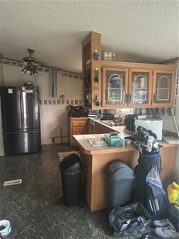 341 Bridgeport Road Mount Pleasant, PA 15666 - Photo 4 of 19 a kitchen with sink refrigerator and stove