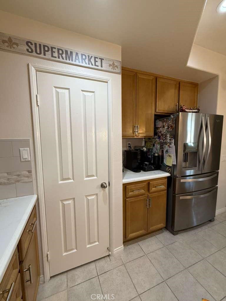 2931 Esperanza Way, Unit B Simi Valley, CA 93063 - Photo 15 of 49 a kitchen with stainless steel appliances a refrigerator and a stove top oven