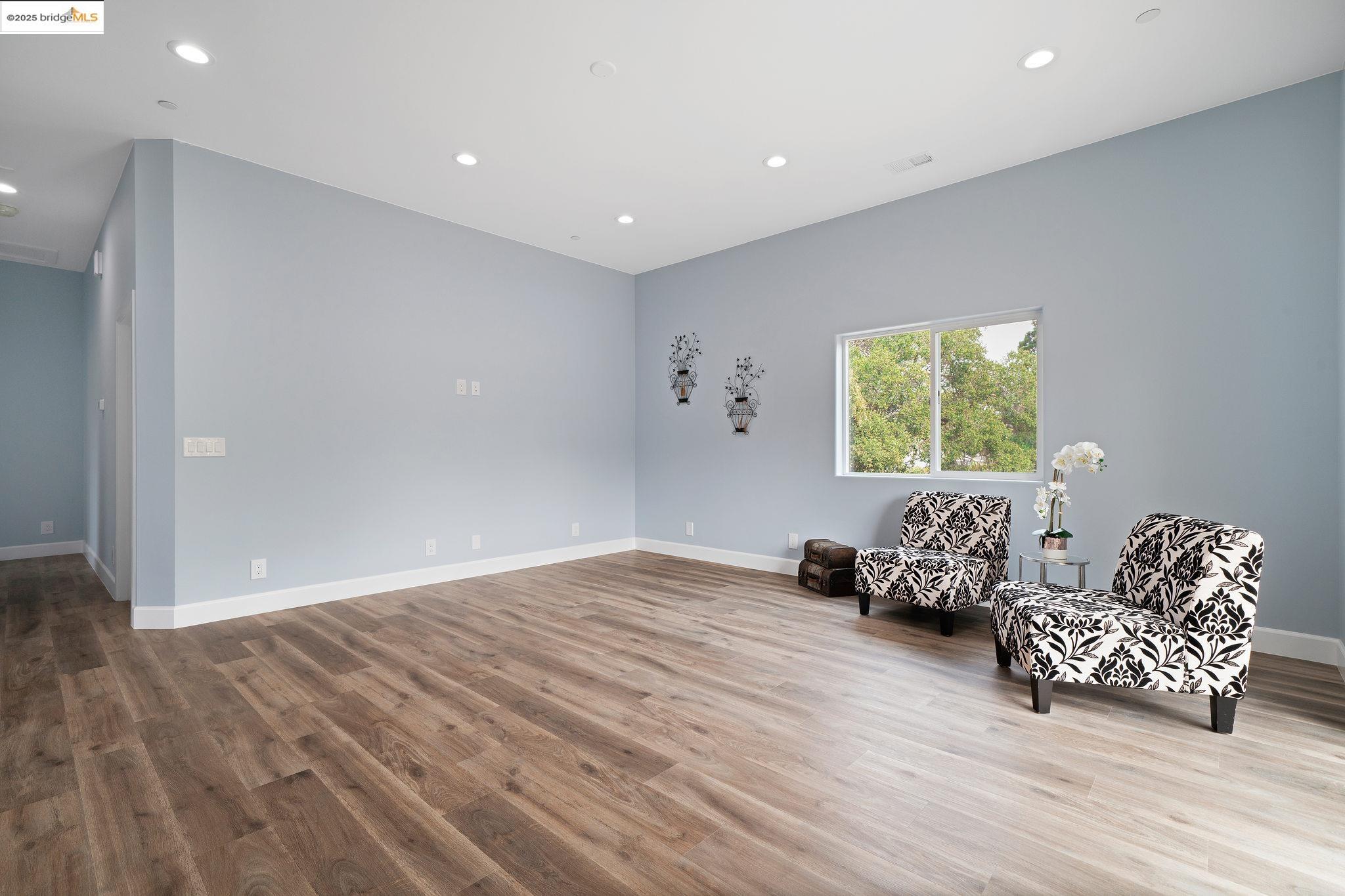 4511 Elmwood Road El Sobrante, CA 94803 - Photo 15 of 42 a room with furniture and a window