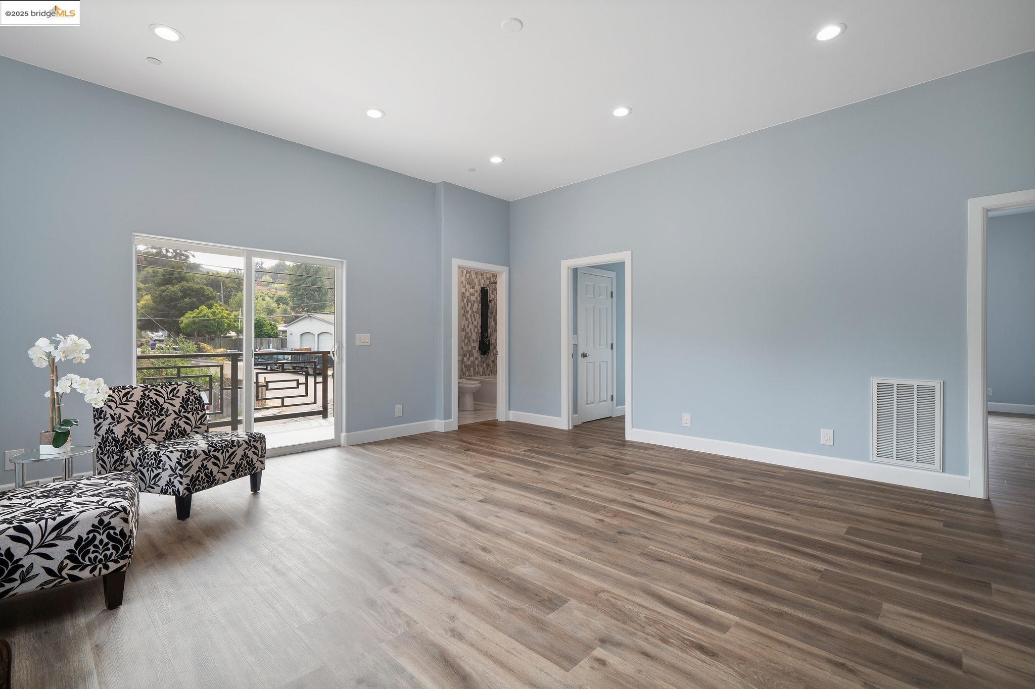 4511 Elmwood Road El Sobrante, CA 94803 - Photo 16 of 42 a view of livingroom with furniture window and wooden floor