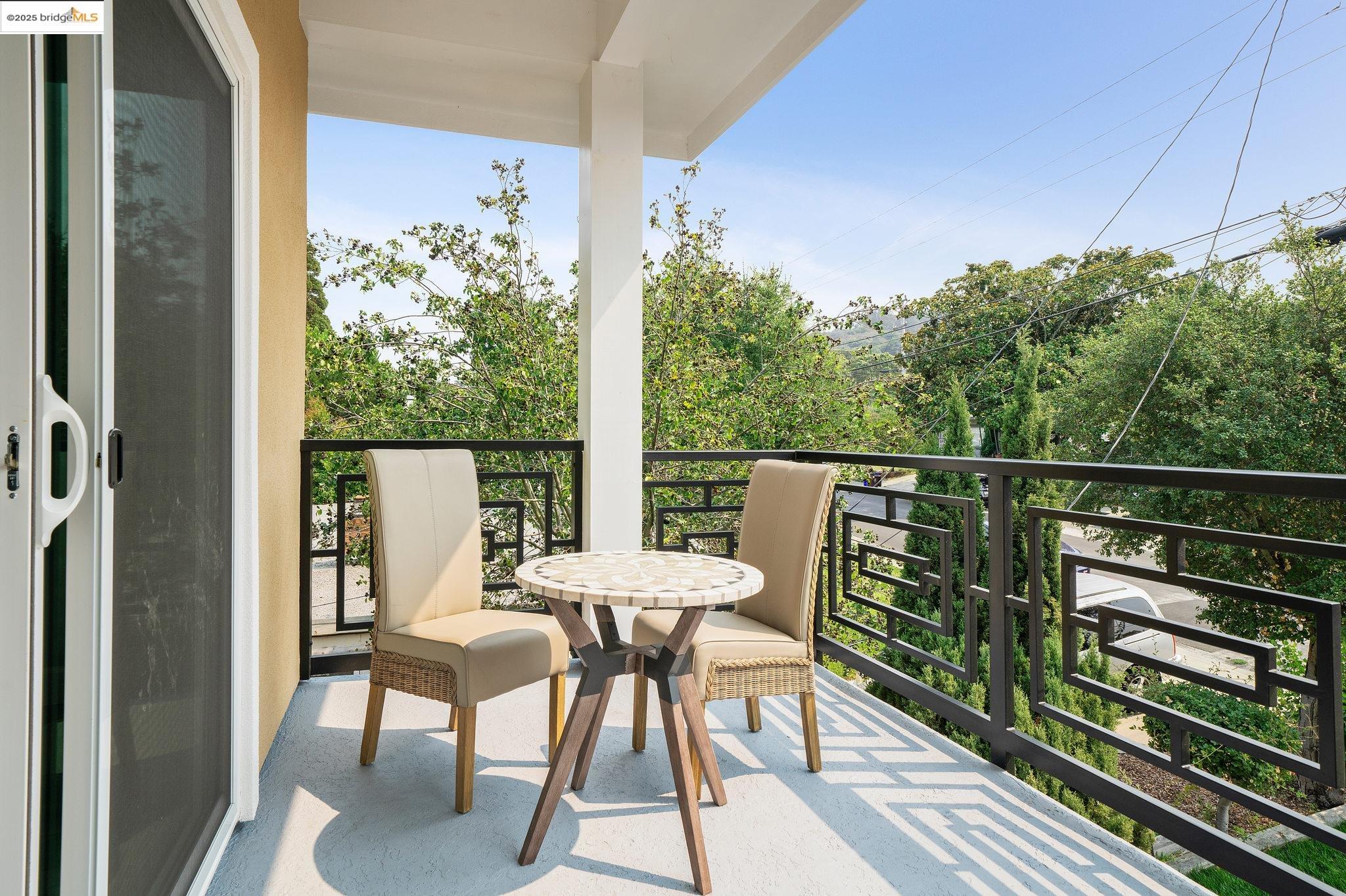 4511 Elmwood Road El Sobrante, CA 94803 - Photo 20 of 42 a view of a chairs and table in the balcony