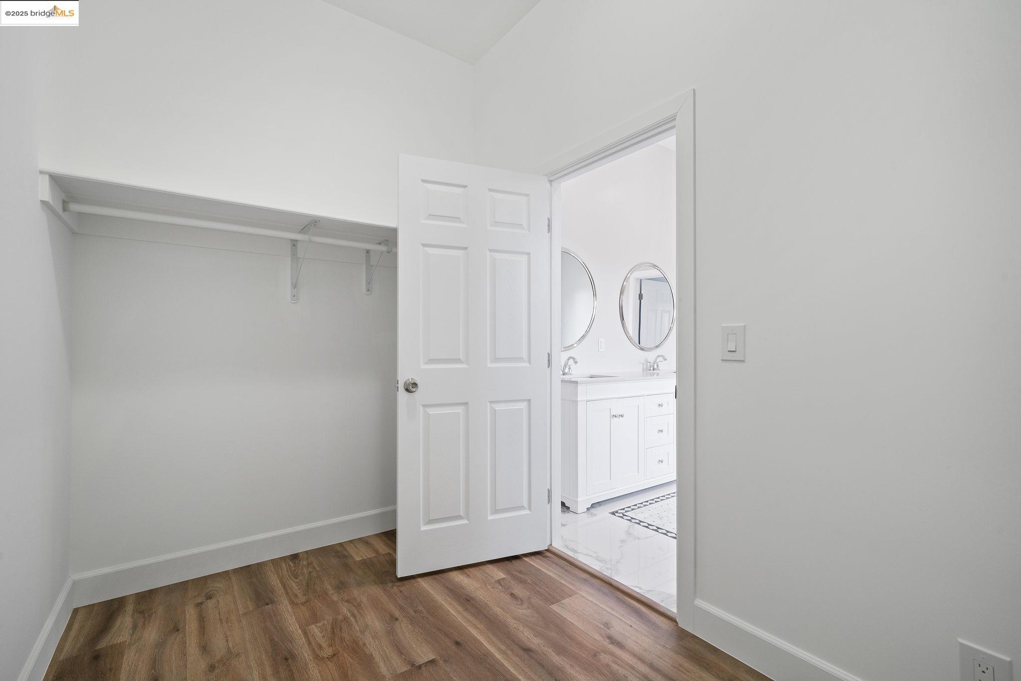 4511 Elmwood Road El Sobrante, CA 94803 - Photo 28 of 42 a view of hallway with wooden floor