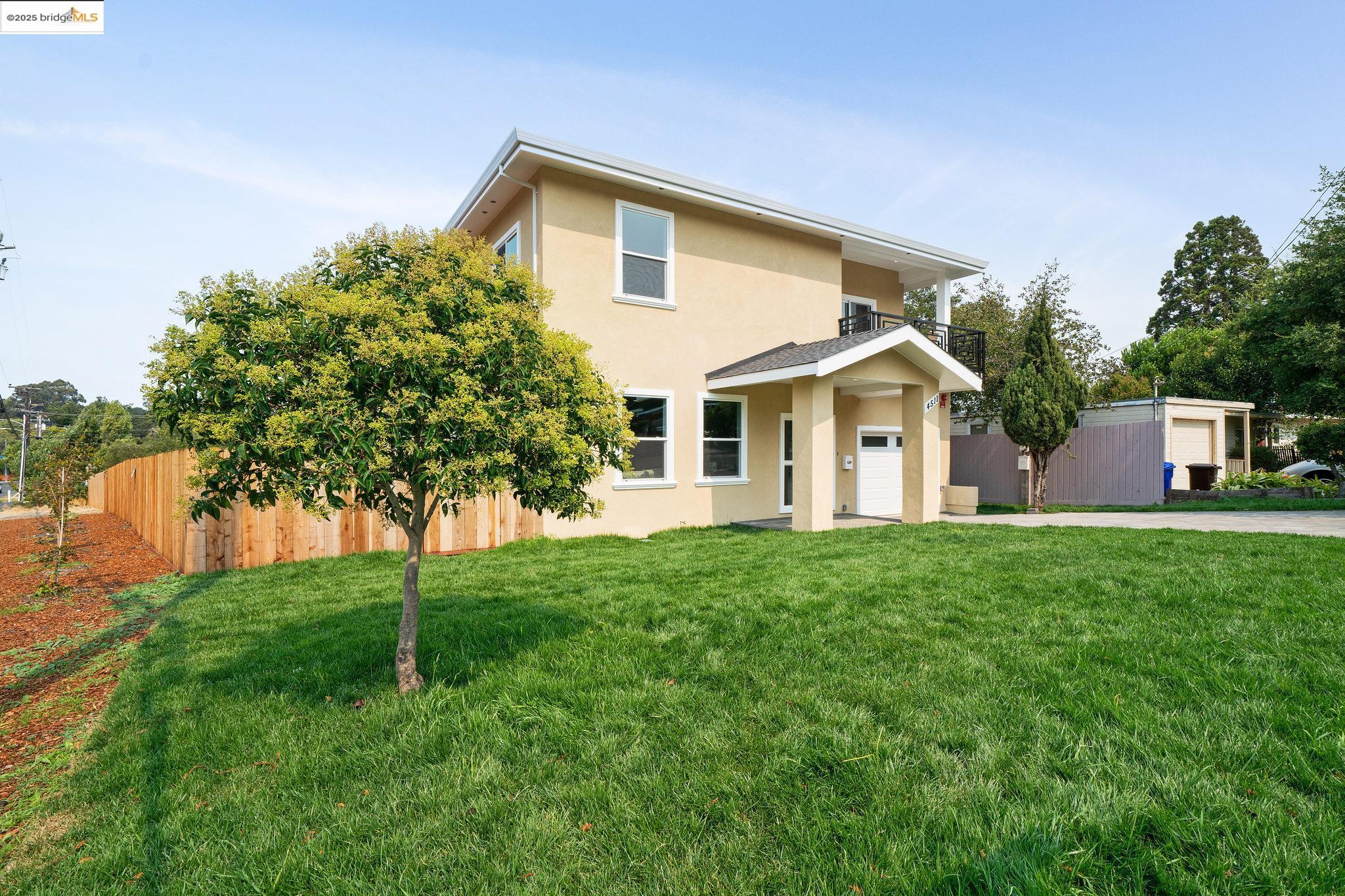 4511 Elmwood Road El Sobrante, CA 94803 - Photo 3 of 42 a front view of house with a garden